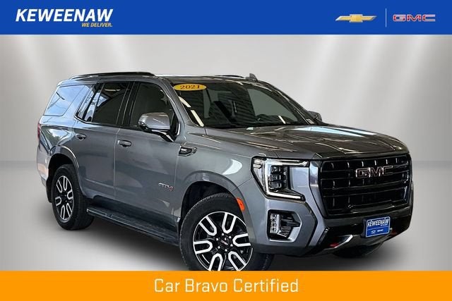 2021 GMC Yukon AT4 in Satin Steel Metallic — front three-quarter view