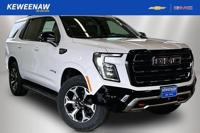 2026 GMC Yukon AT4 in Summit White — front three-quarter view