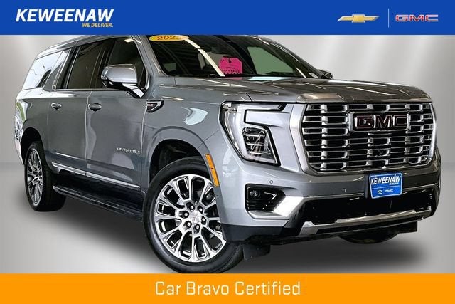 2025 GMC Yukon XL Denali in Sterling Metallic — front three-quarter view