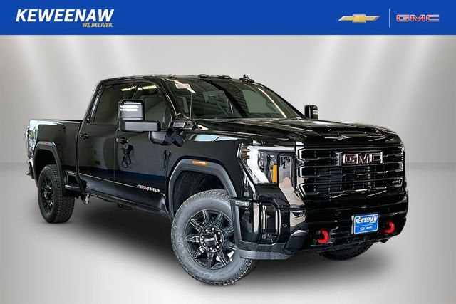 2026 GMC Sierra 3500 HD AT4 in Onyx Black — front three-quarter view