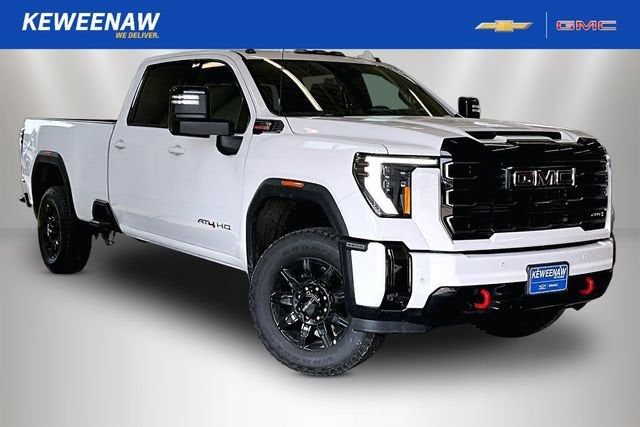 2026 GMC Sierra 3500 HD AT4 in Summit White — front three-quarter view