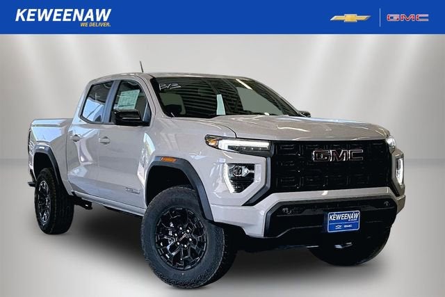 2026 GMC Canyon Elevation in Coastal Dune — front three-quarter view