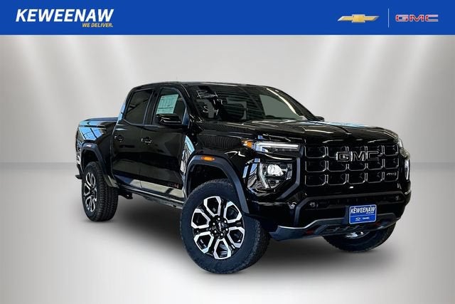 2026 GMC Canyon AT4 in Onyx Black — front three-quarter view