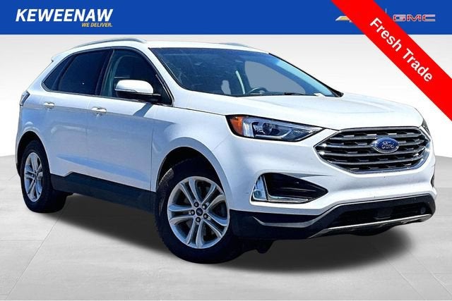 2020 Ford Edge SEL in White — front three-quarter view
