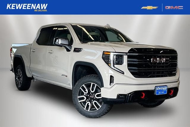 2026 GMC Sierra 1500 AT4 in Coastal Dune — front three-quarter view